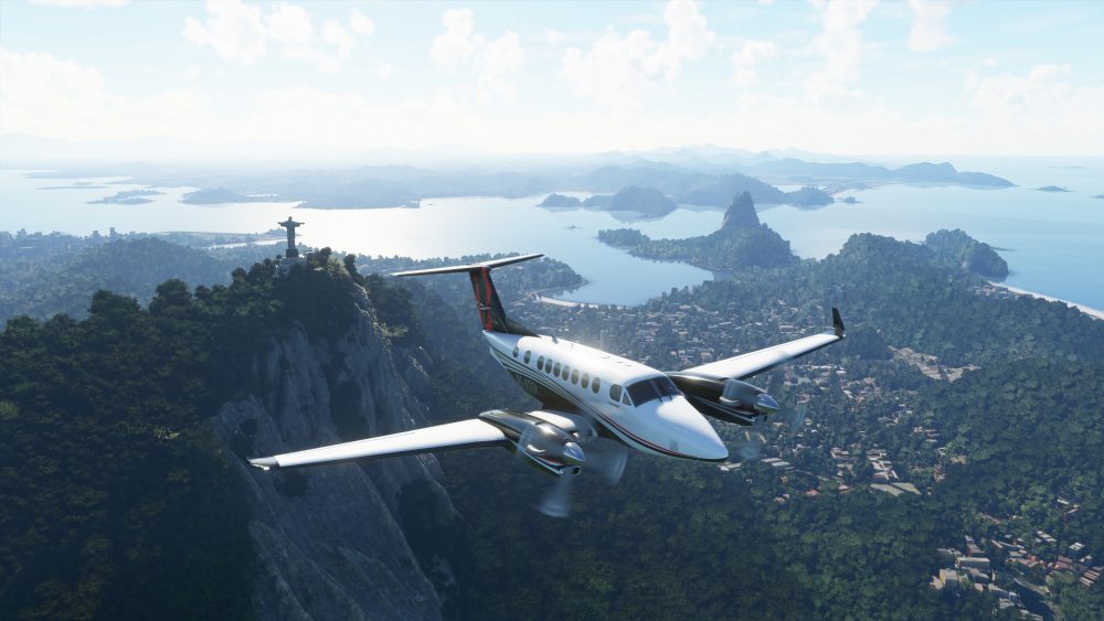 A screenshot of flight simulator 2020 showing a plane over the mountains of brazil
